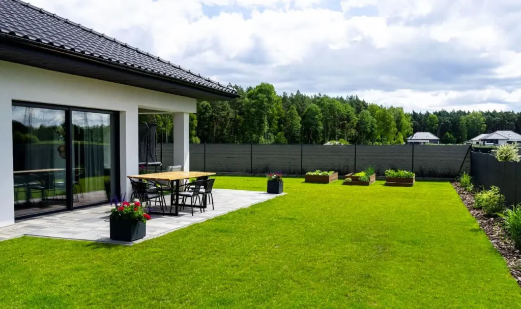 Modern backyard with a privacy fence.